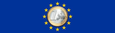 Imagen del diseño de la bandera de la U.E. con una moneda de un euro en el centro