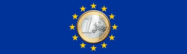 Imagen del diseño de la bandera de la U.E. con una moneda de un euro en el centro